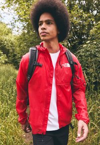 The North Face WINDSTREAM SHELL - Windbreakers - high risk red