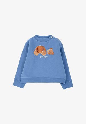 Felpa blu realizzata in morbido tessuto, con grafica di un orsetto marrone e testo "Palm Angels" sul davanti. Chiusura a scatto sul collo.