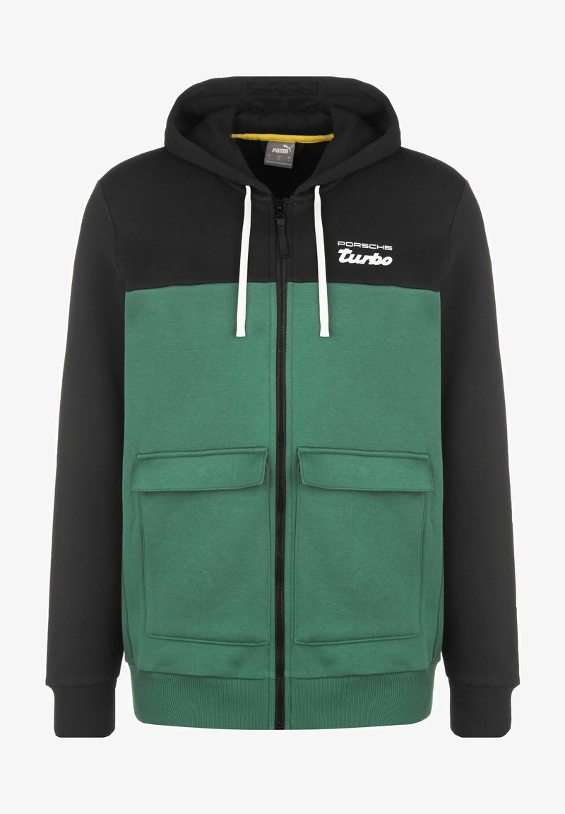 Sweatshirt à capuche zippé avec un corps vert et des manches noires, fabriqué en tissu doux, avec deux poches avant et des cordons blancs.