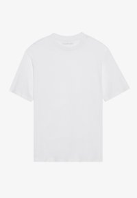 Short-sleeve white T-shirt made of soft cotton. Features a crew neck and straight hem, with minimal design and no visible logos.