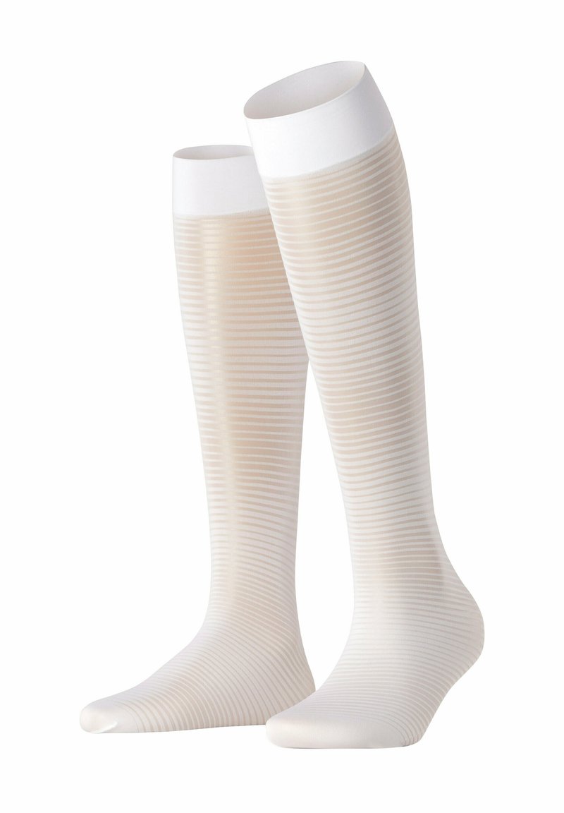 Knielange Socken in Beige mit dezenten weißen Streifen. Glatte Textur mit einem weißen oberen Bündchen. Das Design betont Komfort und Stil.