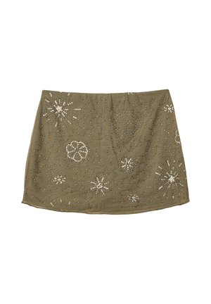 Olive green skirt with a fitted waist, featuring silver bead embellishments in floral and star patterns, creating a textured surface design.