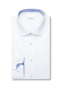 Chemise blanche en coton avec un col et des poignets intérieurs à motif cachemire bleu. Dotée de boutons standards et d'un col classique.
