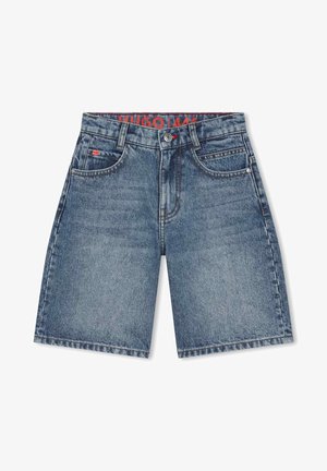 Szorty dżinsowe z zapięciem na guziki z przodu, szlufkami na pasek oraz pięcioma kieszeniami, charakteryzujące się wyblakłym wykończeniem i małą czerwoną metką z logo na prawej kieszeni.