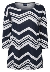 Námořnický modrý a bílý vrch s dlouhým rukávem, se vzorem v zig-zag, s kulatým výstřihem a volným střihem. Vyrobeno z měkké, lehké tkaniny.