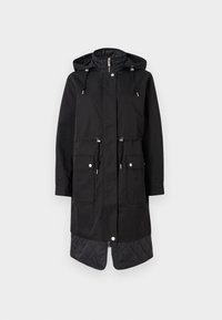 Svart parka med hette, elastiske snorlås, to frontlommer, kontrastfarget, quiltet nedre del, sølvfarget beslag og glidelås-lukking.