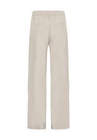 Pantalon beige à coupe décontractée avec une taille élastique, deux poches arrière et une texture lisse. Jambes larges pour le confort et la liberté de mouvement.
