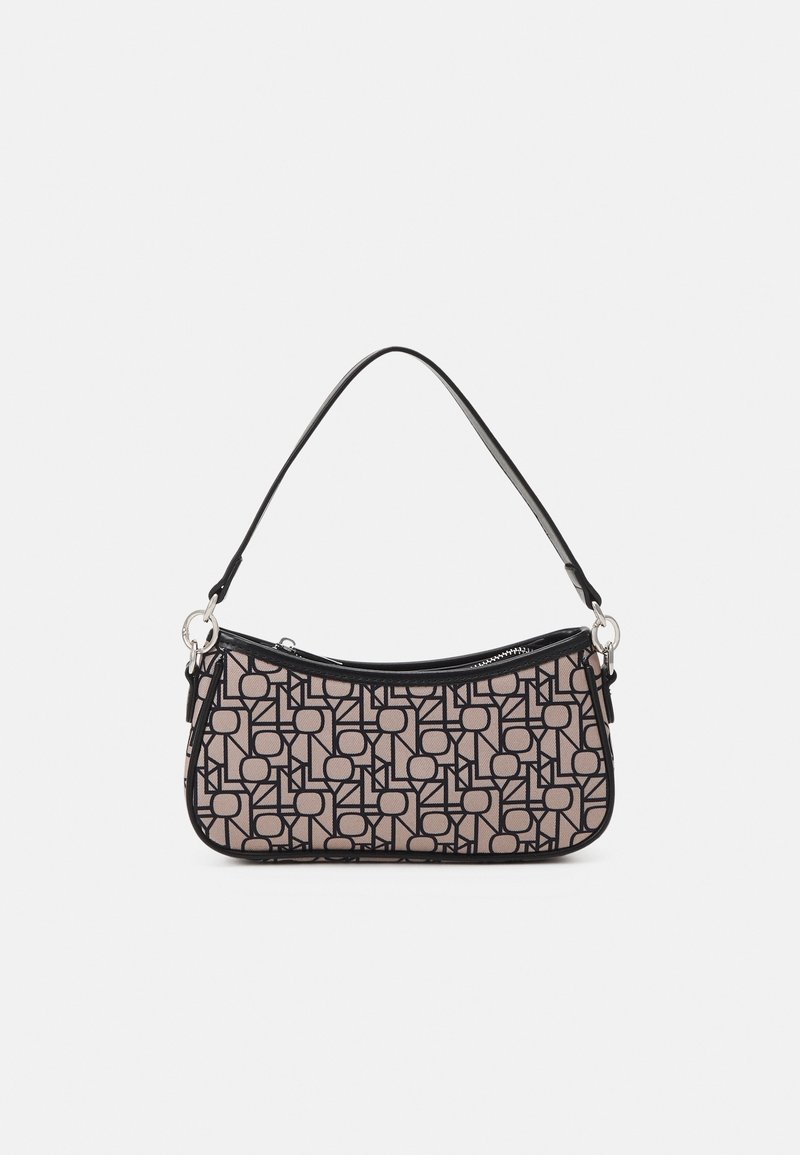 Sac hobo avec un imprimé géométrique comprenant un tissu rose avec des contours noirs, forme arrondie, fermeture éclair et une bandoulière noire.