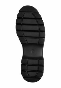 Suola di scarpa in gomma nera con una superficie texturizzata, caratterizzata da scanalature e nervature per una migliore aderenza, contrassegnata con la taglia 37 al centro.