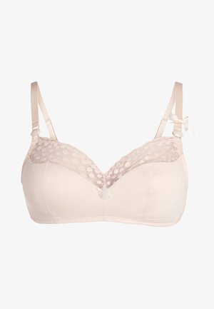 Draadloze bh in zacht beige met kantpaneel en een polka-dot patroon aan de bovenkant. Verstelbare bandjes en decoratieve strikdetail aan de voorkant.