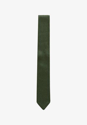 Cravate texturée vert foncé de forme étroite avec une pointe pointue, présentant un motif tissé subtil sur l'ensemble. Convient pour des occasions formelles.