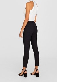 Stradivarius Tygbyxor - black