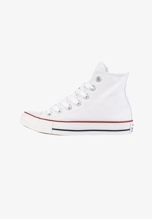 Valkoinen korkea kangastennari, jossa on kumipohja, valkoiset nauhat, punainen ja sininen raita keskiosassa sekä metalliset reiät nauhojen kiristämistä varten.