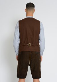 JCC Väst - brown