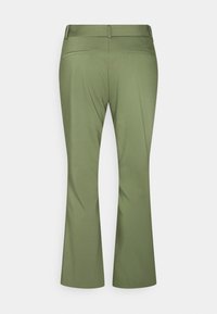 Olive green women's trousers with a fitted waist, belt loops, rear welt pockets, and slightly flared legs shown from the back.
