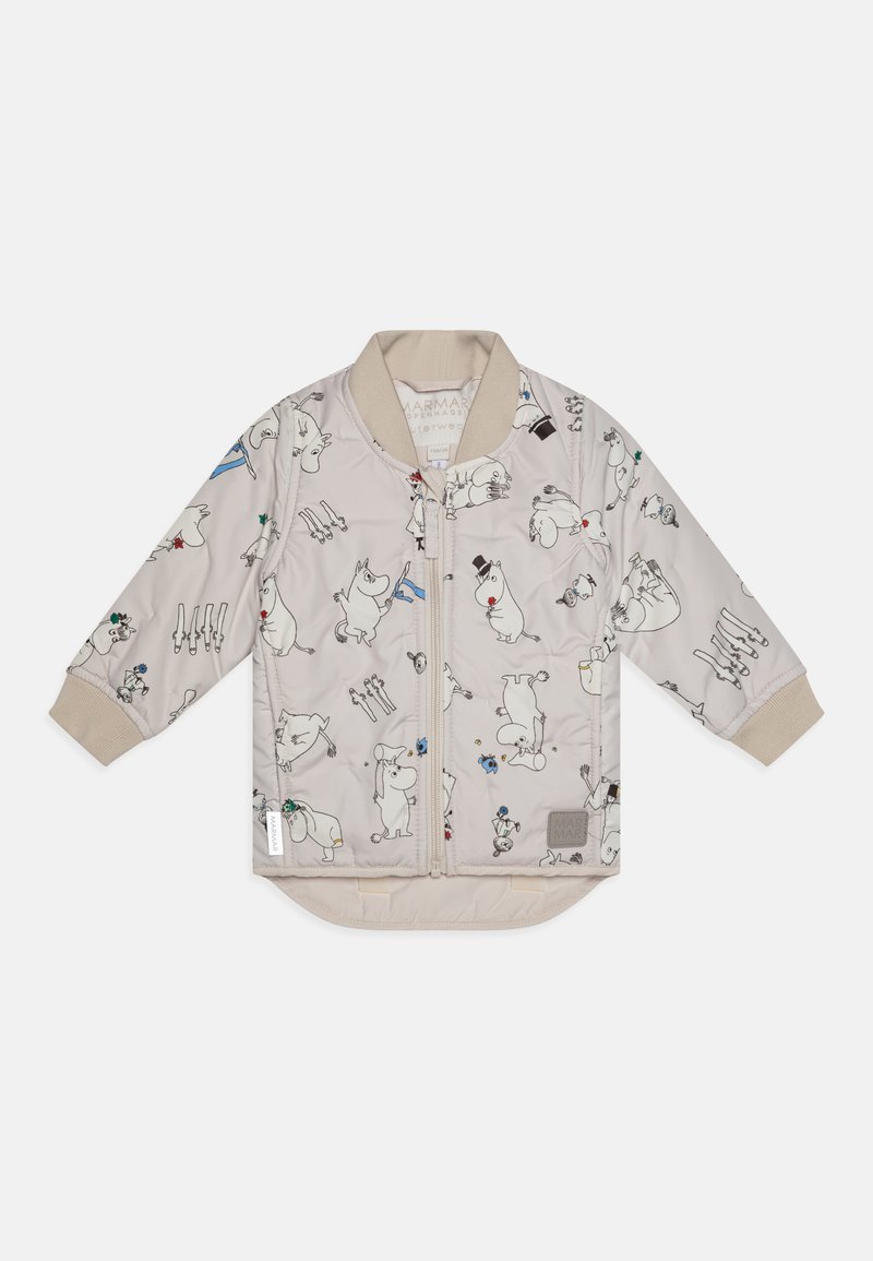 Pledinė smėlio spalvos striukė su ilgomis rankovėmis, raukšlėtais rankogaliais, priekiniu užtrauktuku ir piešiniais su animacinių filmų gyvūnais. Yra apvalus galas ir logotipo etikete.