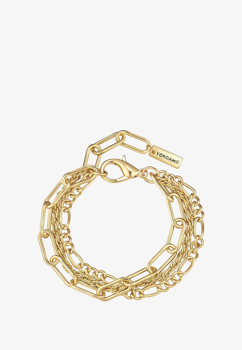Zlatý náramok s prepojenými oválnymi a guľatými článkami, vybavený karabínkou a gravírovanou štítkou s detailom značky "Yokoami."