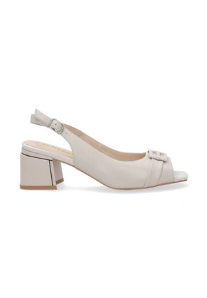 Beige leather slingback shoe with a peep-toe, chunky block heel, and decorative strap featuring a double square buckle accent.