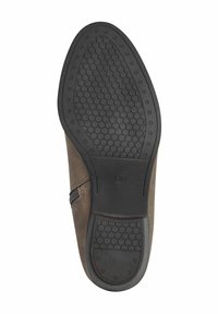 Hnědá kožená bota s texturovanou gumovou podrážkou, která má hexagonální vzor, boční zip a velikost 37 označenou na podrážce.