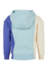 Felpa color block in blu chiaro, blu morbido e crema. Presenta un cappuccio, maniche lunghe e polsini a costine. Materiale in misto cotone.