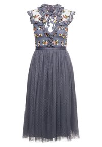 Robe grise avec un corsage brodé de fleurs et des détails à volants, jupe en tulle à motif de pois. Se porte en l'enfilant par la tête.