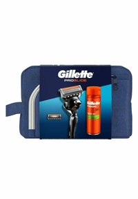 Gillette ProGlide -parranajokone ergonomisella mustalla kahvalla, oransseilla yksityiskohdilla, täyttöpatruuna ja Gillette Fusion -parranajogeeli oranssissa säilytysastiassa, kaikki sinisessä laatikossa.