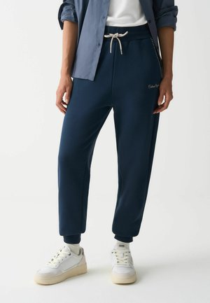 WITH EMBROIDERY - Pantaloni de trening - dark blue