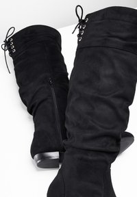bonprix Stivali alti - black