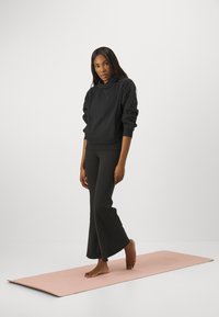 Athleta COZY KARMA HOODIE  - Sweat à capuche - black