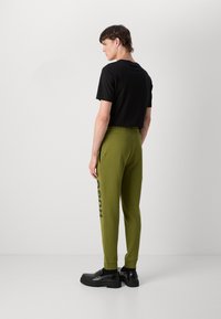 HUGO DUTSCHI - Joggebukse - open green