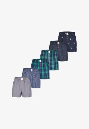 Herenboxers in verschillende kleuren en patronen: gestreept, geruit, met stippen en eenden. Allemaal met een elastische tailleband en knoopsluiting.