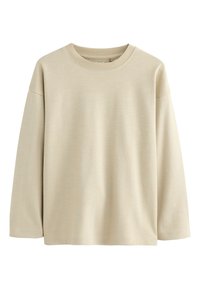 Beež värvi pikkade varrukatega T-särk, valmistatud pehmest puuvillast, millel on ümara kaelusega, lõdva istuvusega ja õrnalt tekstureeritud pind. Ei mingeid mustreid ega aktsente.