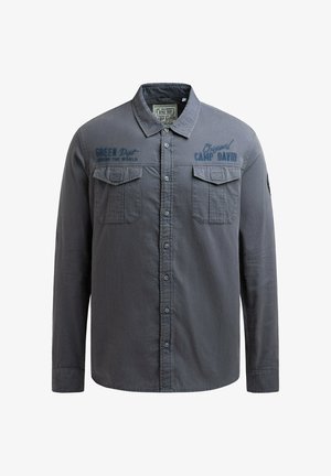 Langärmliges graues Hemd mit Knopfleiste, zwei Brusttaschen und blauen bestickten Details. Verfügt über einen klassischen Kragen und eine weiche Textur.