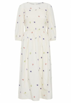 Rochie lungă albă cu un corp brodat, guler rotund și mâneci bufante, având broderie florală multicoloră pe toată suprafața.