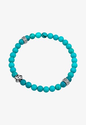 Turkiozo karoliukų apyrankė su lygiomis, matinėmis sferomis, pasižyminti dviem metaliniais akcentais su sudėtingais raštais. Tampri ir apvalios formos.