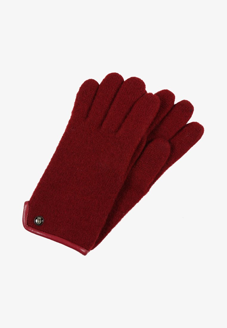 Red wool gloves with a soft texture, featuring leather accents at the cuff and a small metal logo detail. Five-finger design.
