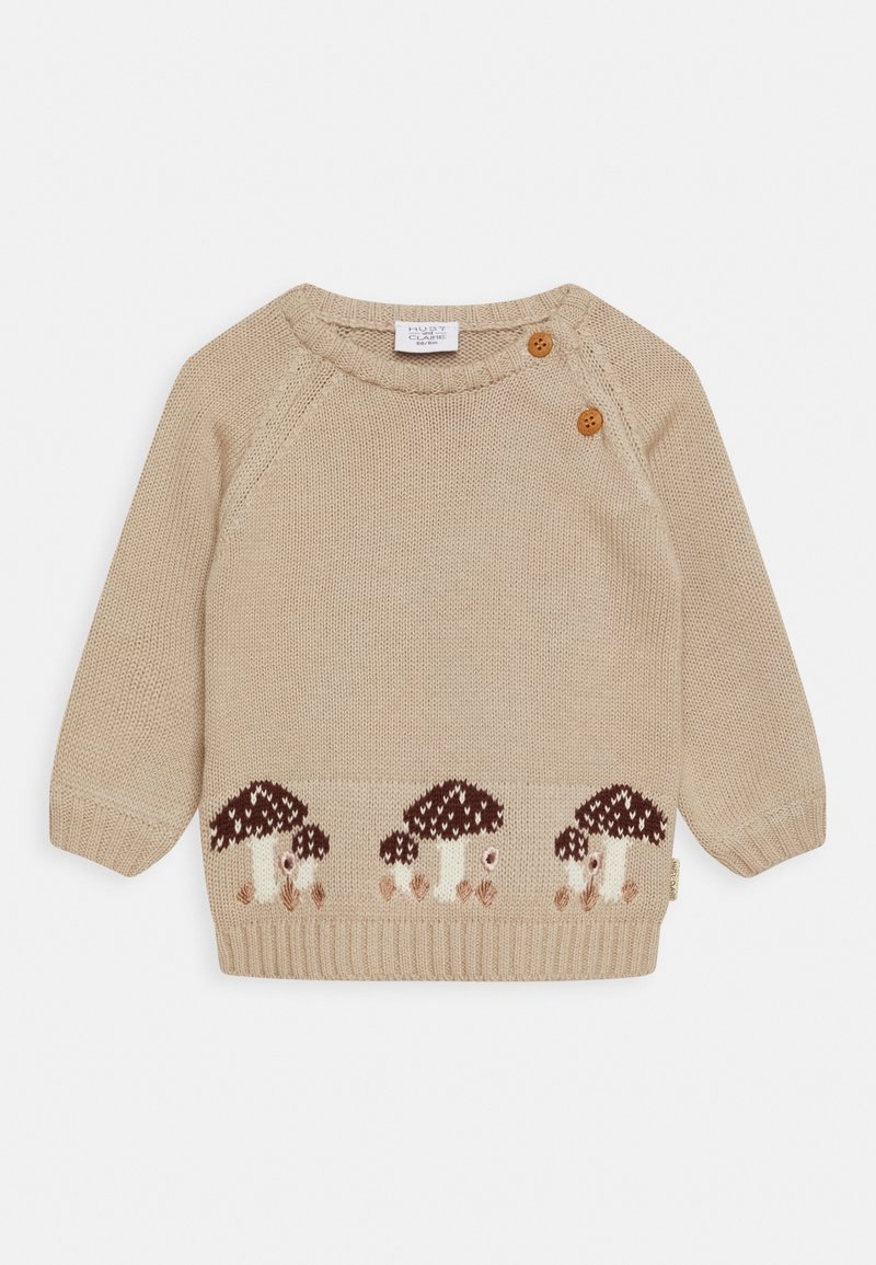 Pull bébé en tricot beige à manches longues, avec deux boutons en bois près du col et trois motifs de champignons marron et blancs le long de l'ourlet.