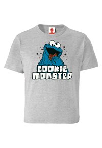 Gray cotton t-shirt featuring a graphic of a blue furry monster eating a cookie, with "COOKIE MONSTER" text in bold white and blue below.