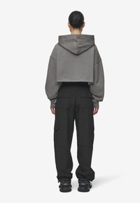 Pegador YURI TRACKSUIT PANTS - Tracksuit bottoms - black