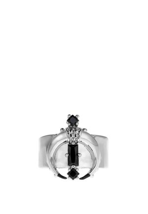 Silver ring with a crescent design and three black square gemstones set in ornate metalwork on a wide band against a white background.