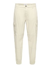 Lys beige cargobukser lavet af bomuldsblanding med flere sidelommer, elastiske manchetter og klassisk knap- og lynlåslukning.