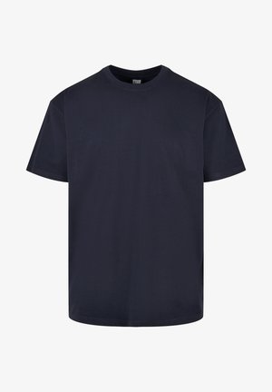 T-shirt en coton bleu marine à manches courtes, à encolure ronde et à coupe relaxée. Texture lisse, sans motifs ni embellissements visibles.