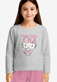 Maglietta grigia a maniche lunghe con una grafica di Hello Kitty in rosa, con un fiocco e stelle, realizzata in tessuto morbido per il comfort.