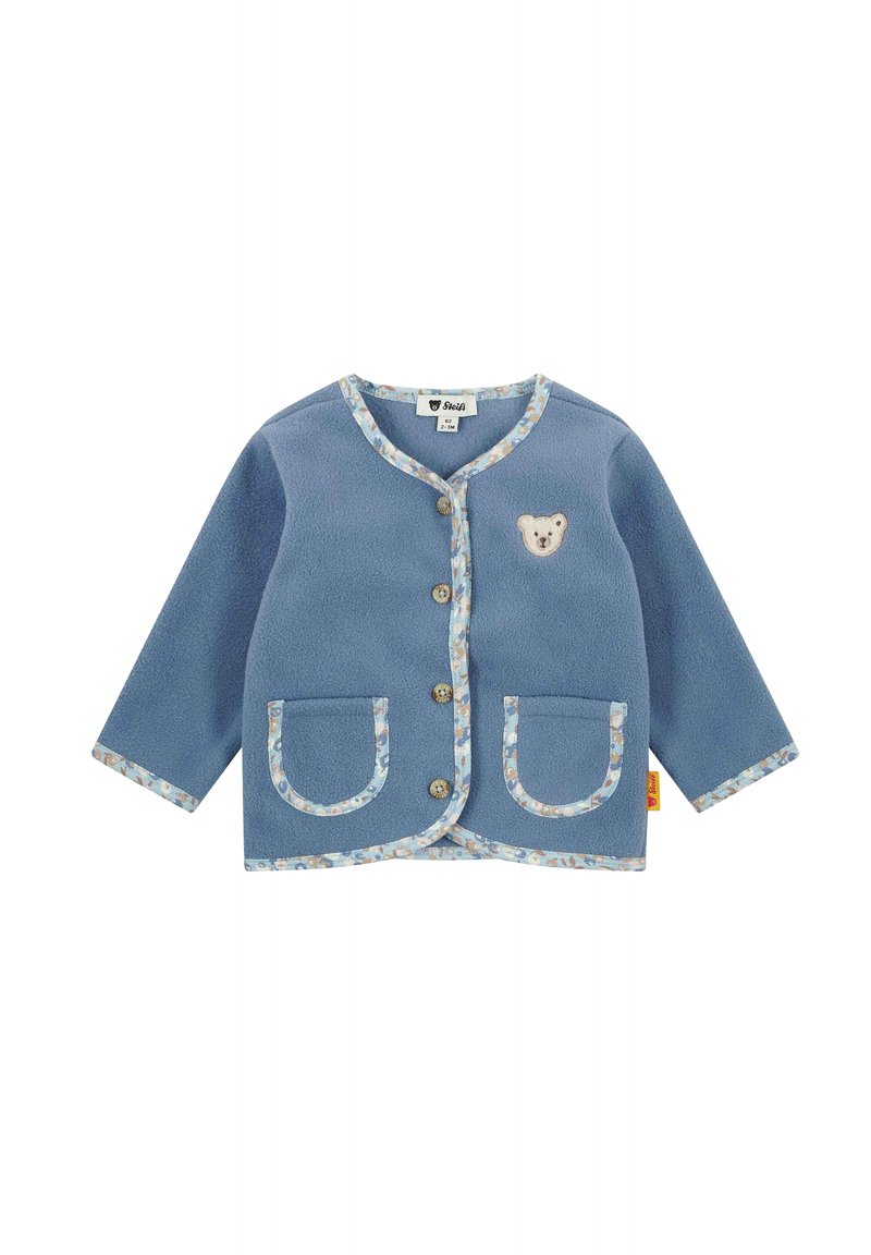 Blue fleece jacket with floral trim, featuring two pockets and a bear appliqué on the left chest. Four buttons on the front.