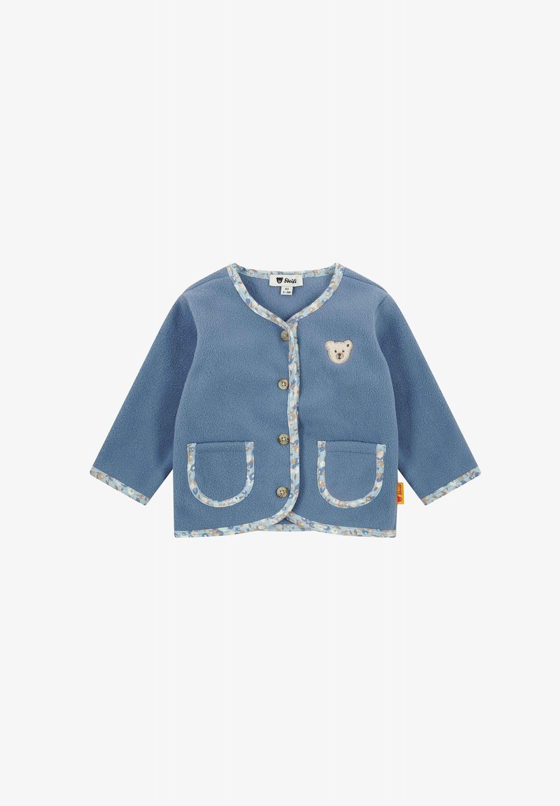 Blue fleece jacket with floral trim, featuring two pockets and a bear appliqué on the left chest. Four buttons on the front.