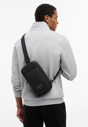 Tommy Hilfiger, FOUNDATION SLING PACK UNISEX - Olkalaukku - black