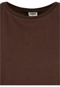 Brun crew-neck t-shirt i mjuk bomull, med en slät textur och en enkel design. Etikett synlig inuti kragen.