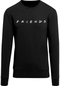 Svart sweatshirt med ordet "FRIENDS" i hvitt, pyntet med fargerike prikker, rund hals og lange ermer. Glatt tekstur.