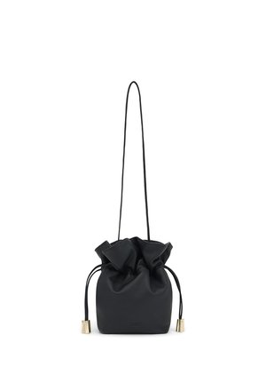 Czarna torba typu bucket z trokami, długim cienkim paskiem i złotymi metalowymi akcentami na końcach troków.