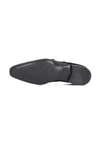 Black leather dress shoe sole featuring a smooth surface, embossed text, and slightly rounded heel with a narrow toe shape.